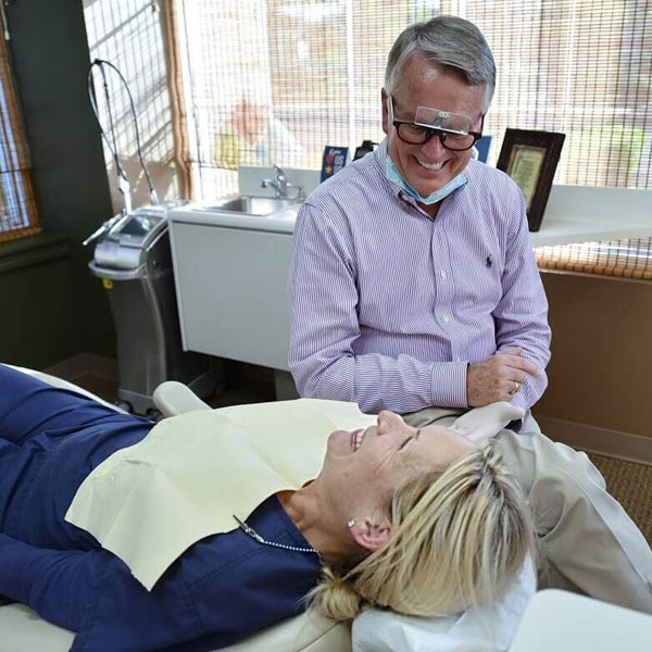 dentist laughing with patient